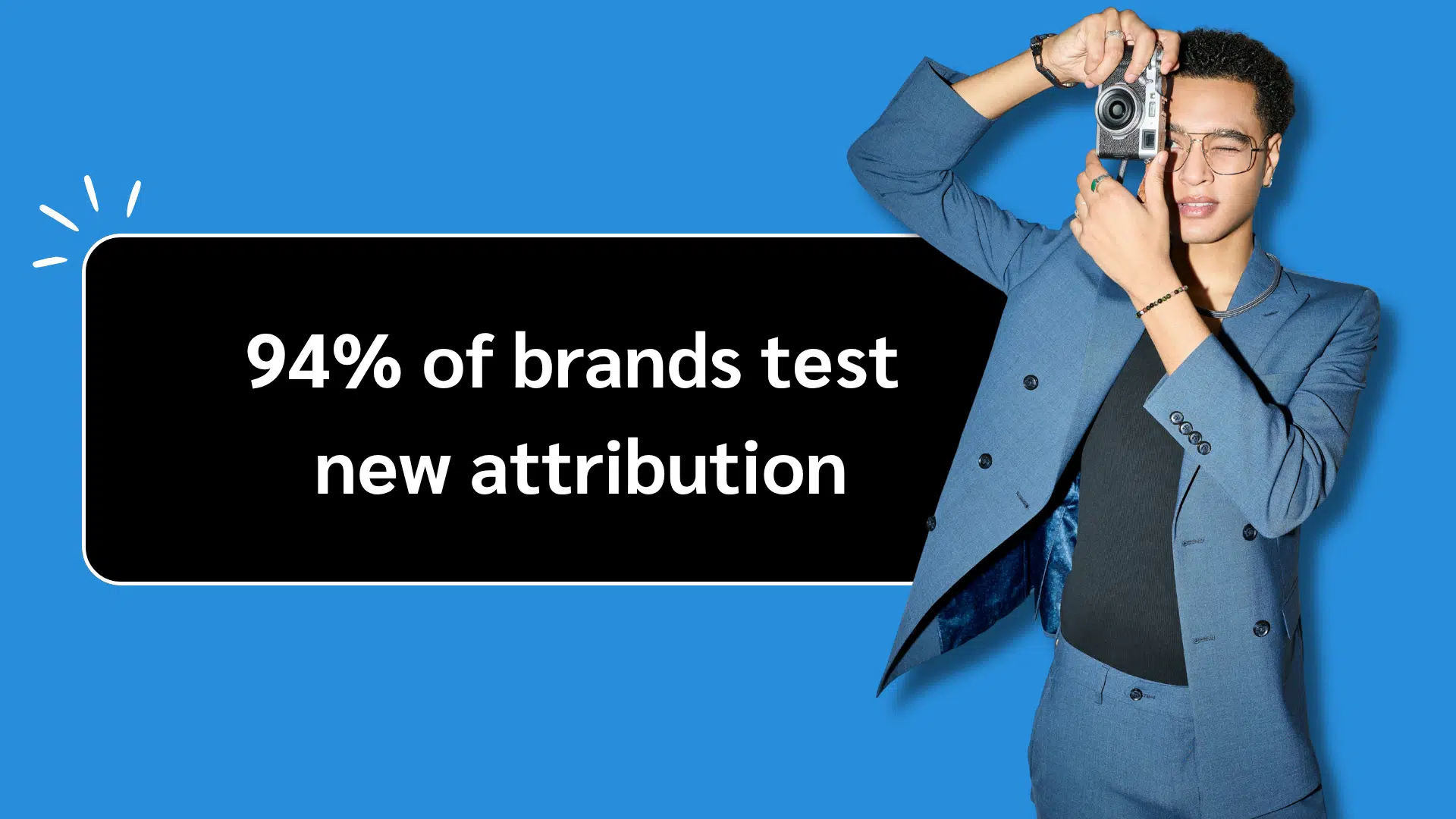 A man in a suit holds a camera, accompanied by the text "94% of brands test new attribution."