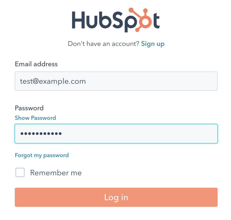 Login page for HubSpot featuring fields for email and password, along with a login button and branding elements.