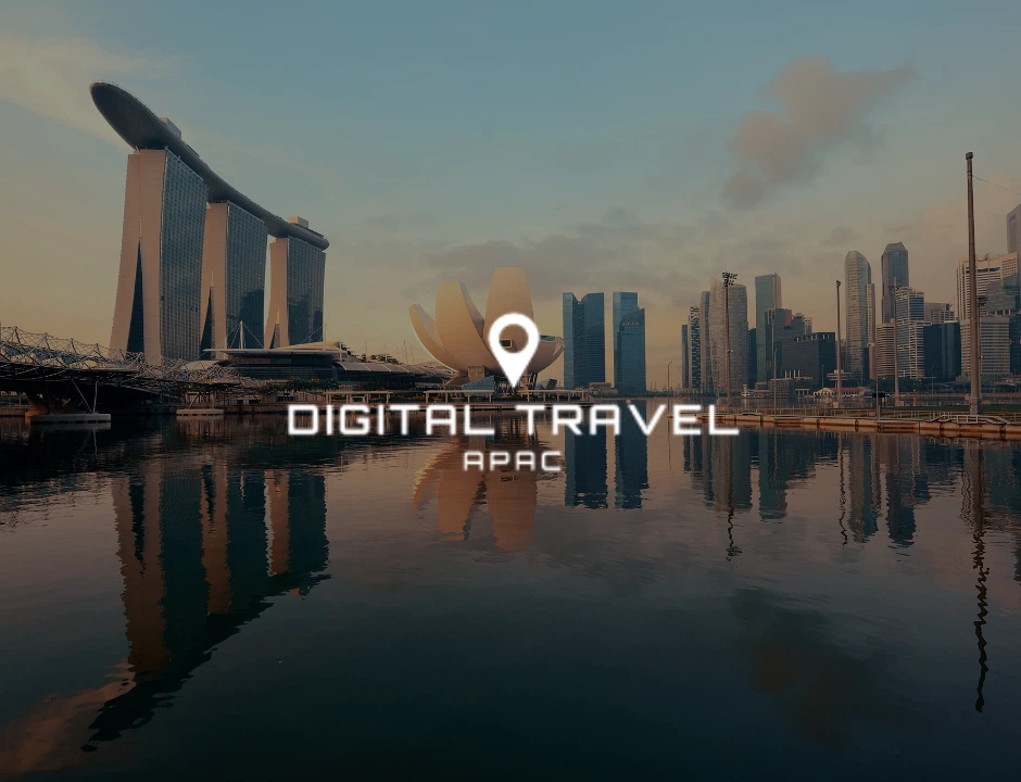 Modern skyline of Singapore featuring iconic structures, reflecting in the water, with "Digital Travel APAC" text overlay.
