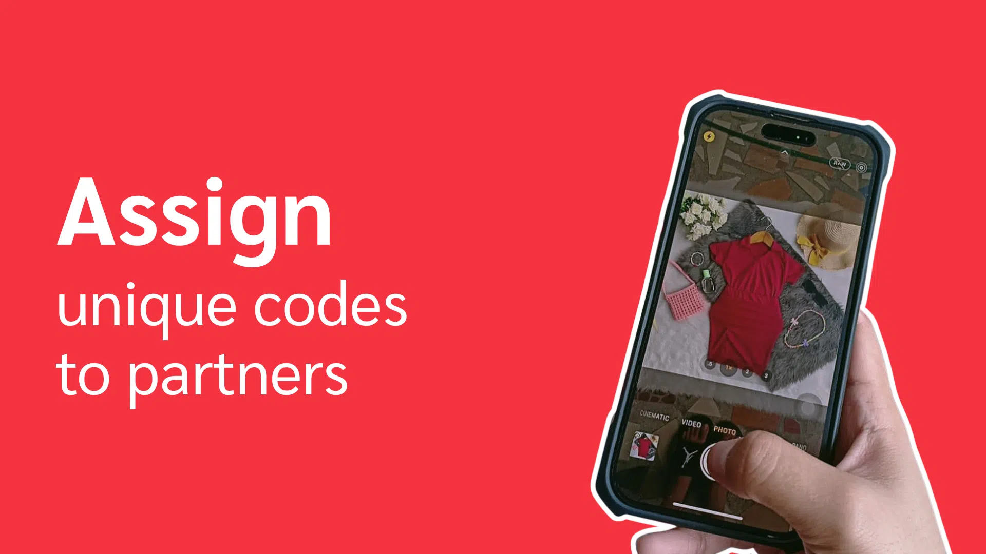 A person holds a smartphone displaying an outfit and accessories, with text about assigning unique codes to partners.