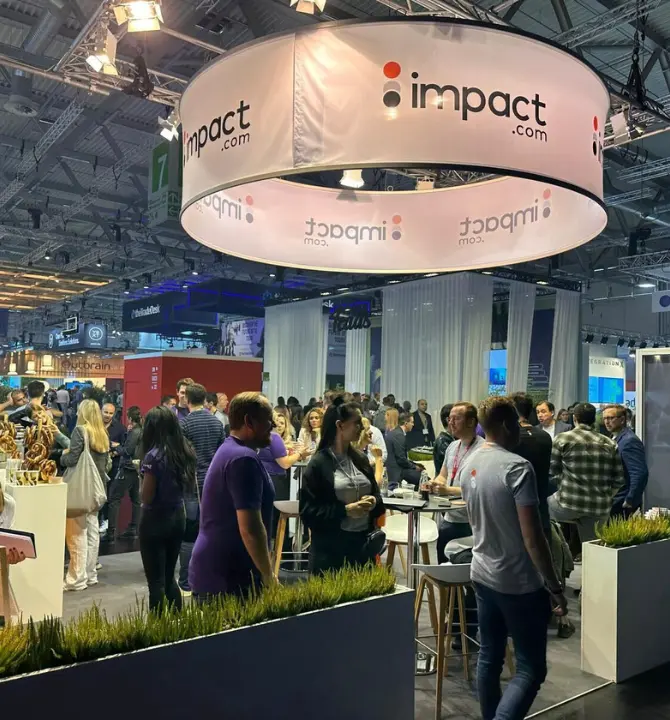 DMEXCO attendees visiting impact.com booth