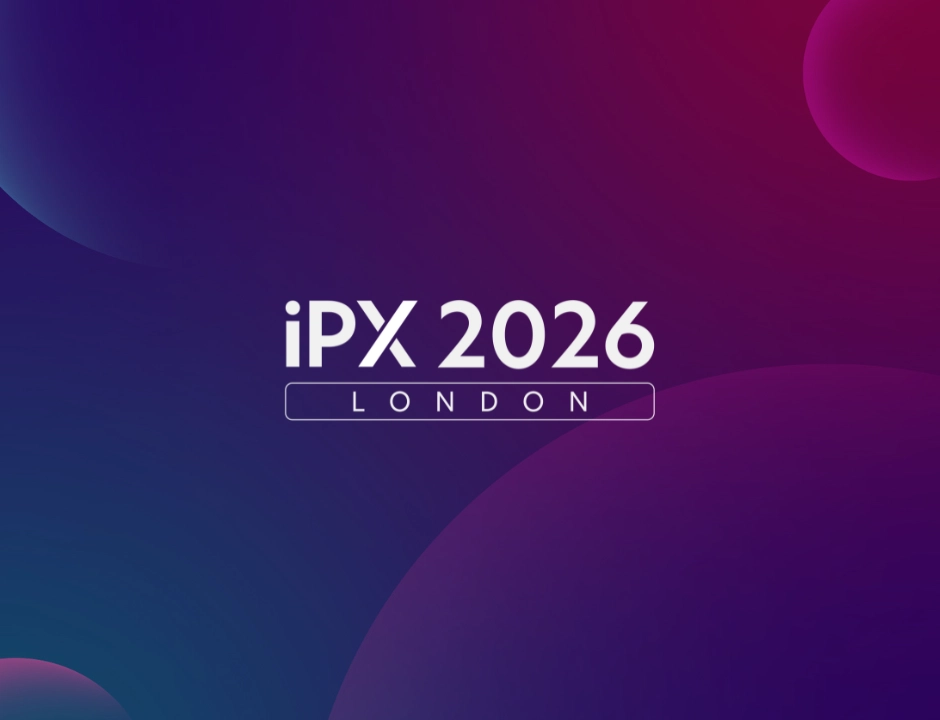 Graphic featuring the text "iPX 2026 London" on a vibrant gradient background of blue and purple hues.