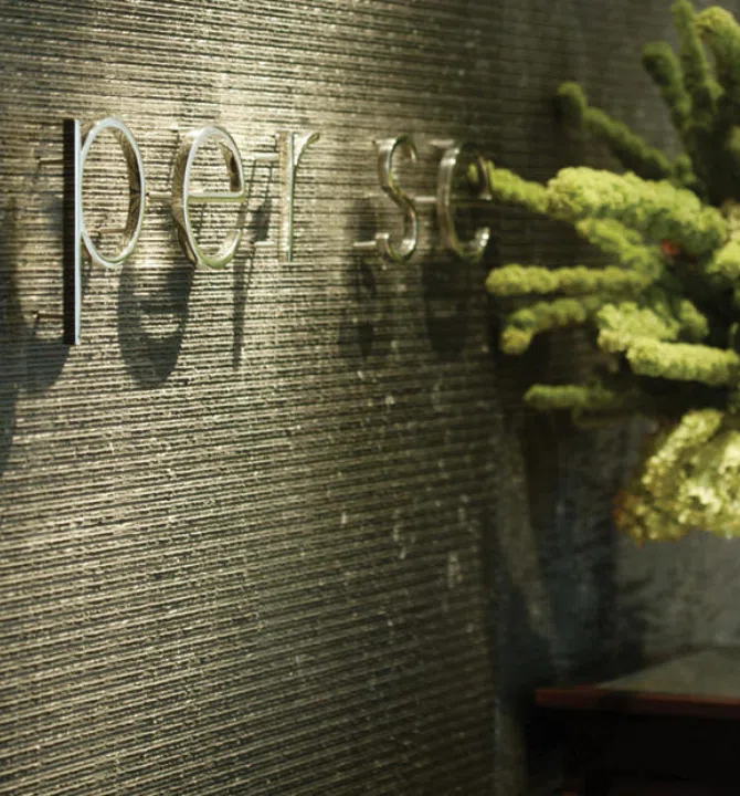 Per Se restaurant wall logo