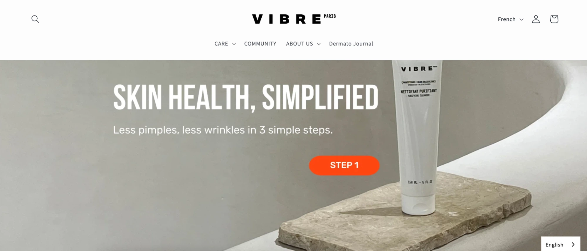 A collection of Vibe skin care products displayed on a wooden surface, showcasing various bottles and jars.