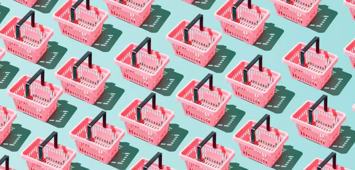 A repeating pattern of shopping carts set against a solid blue background.