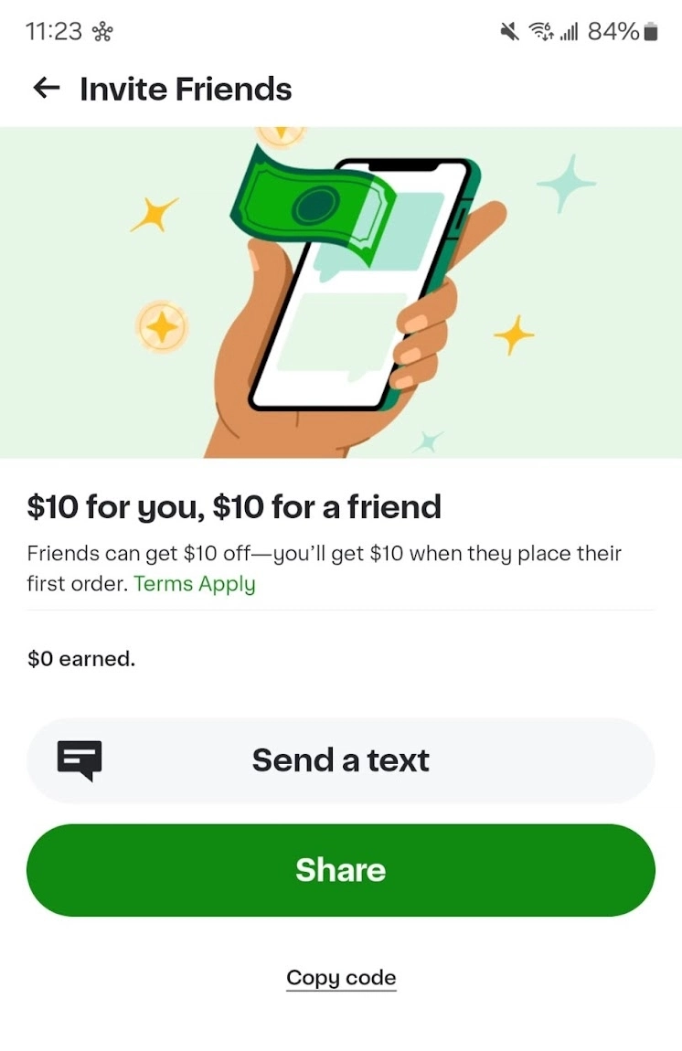 A hand holding a smartphone displays a $10 promotion for inviting friends, featuring a dollar bill and sharing options below.
