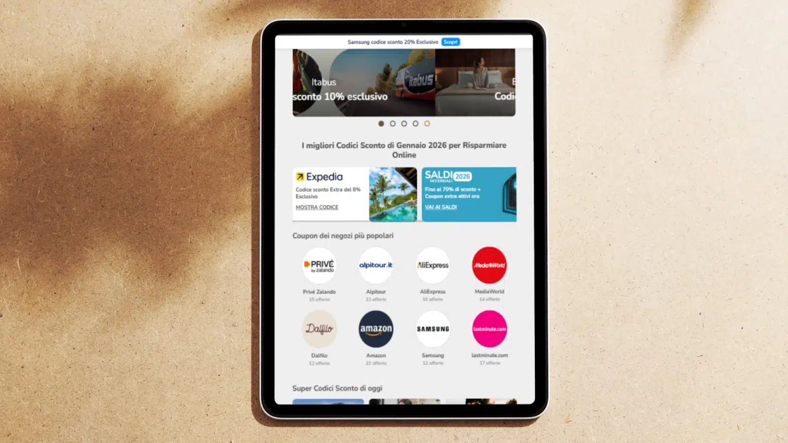 Tablet displaying an online discount coupon website featuring popular brands and exclusive offers for January 2026.