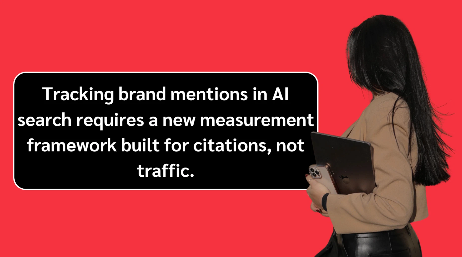 Person holding a tablet and phone beside a text about tracking brand mentions in AI search needing a citation-based measurement framework.