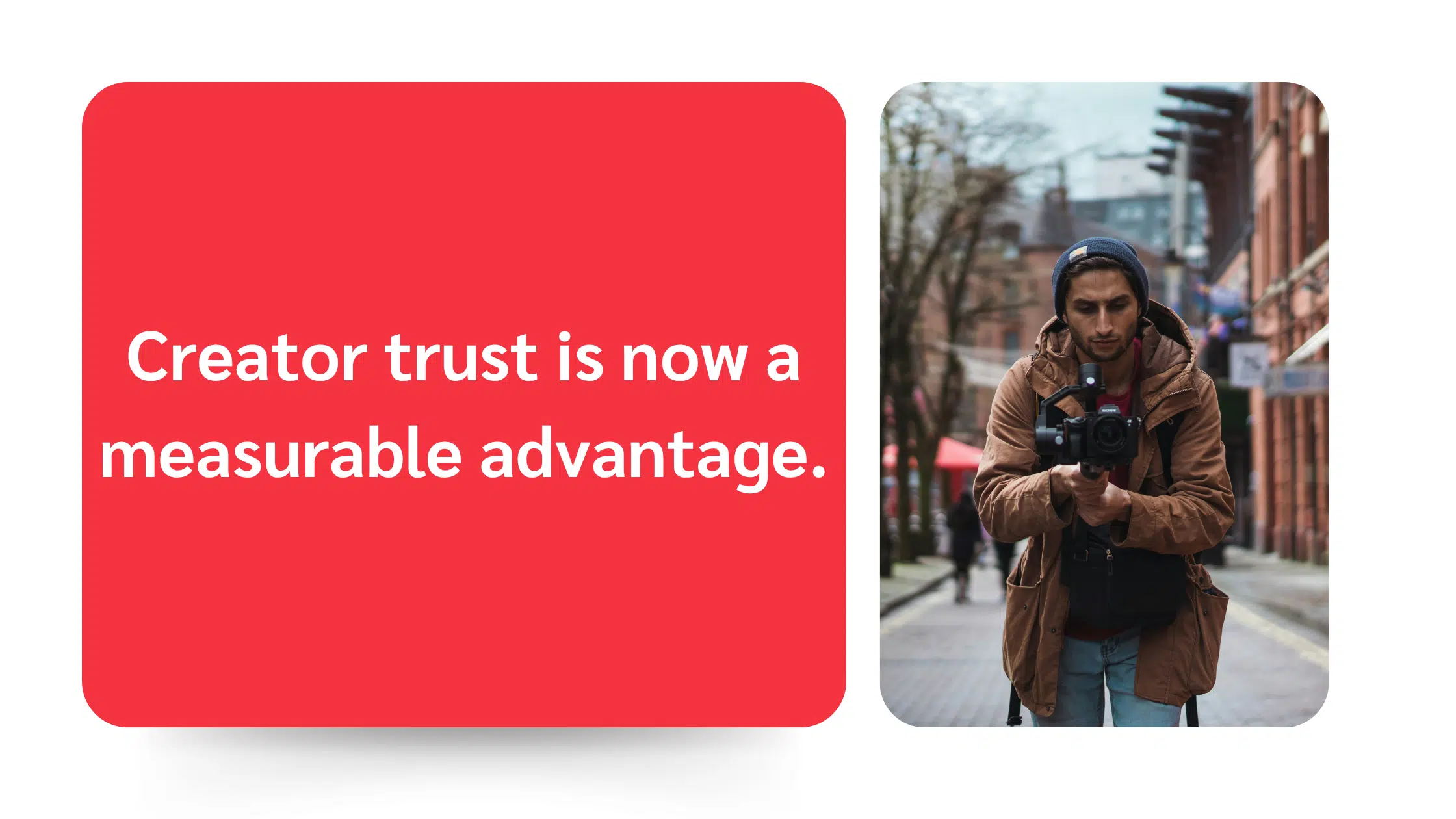 Text "Creator trust is now a measurable advantage" beside a person in a brown jacket holding a camera stabilizer on a city street.