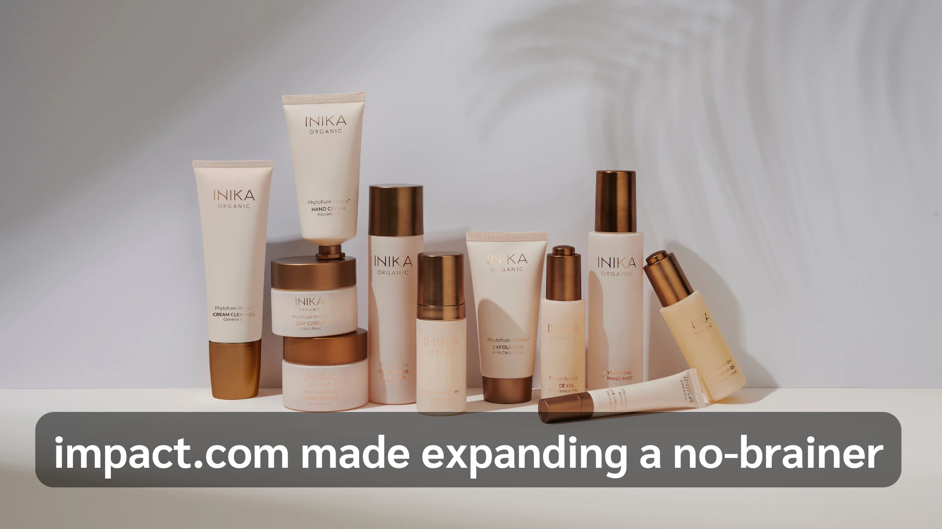 A collection of products featuring the phrase "Impact Com Made: Expanding a No-Brainer" prominently displayed.