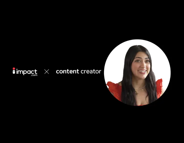 Headshot of Tina-Angelina with black background and impact logo